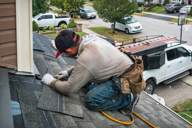 Professional Storm Damage Roof Repair technician working in Washington, MI